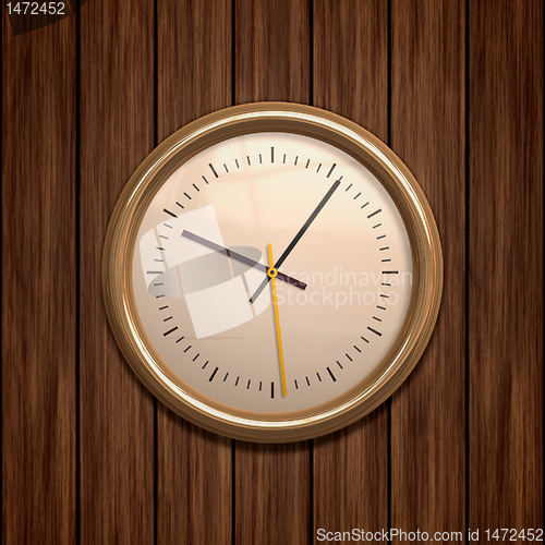 Image of clock on wood