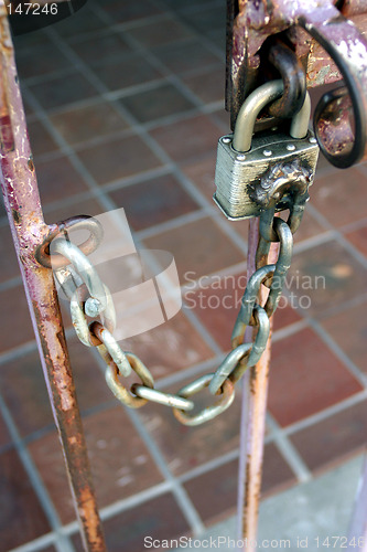 Image of Chain and padlock on old gate
