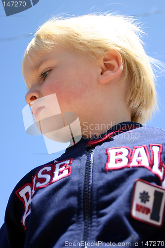 Image of Closeup of blonde boy standing