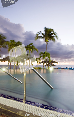 Image of infinity swimming pool dusk St. Maarten St. Martin Caribbean Isl