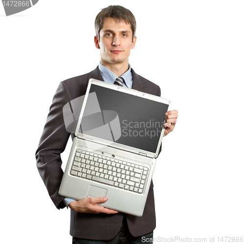 Image of businessman with open laptop in his hands