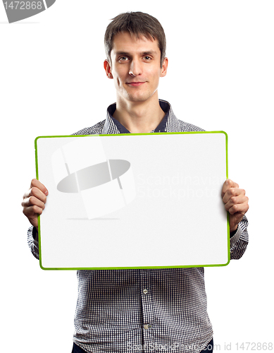 Image of male with write board in his hands