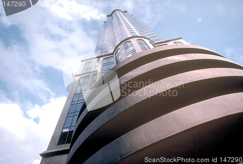 Image of Highrise office building against cloudy sky