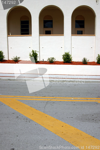 Image of Street line detail with background of three arches