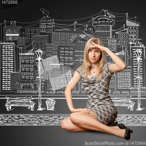 Image of young businesswoman looking forward
