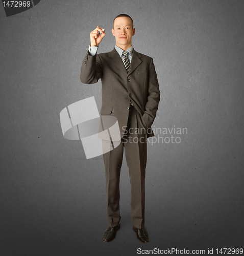 Image of businessman with marker