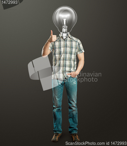 Image of full length man with lamp shows well done