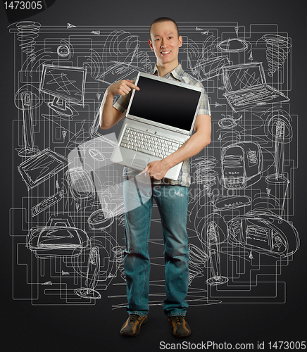 Image of man with open laptop in his hands