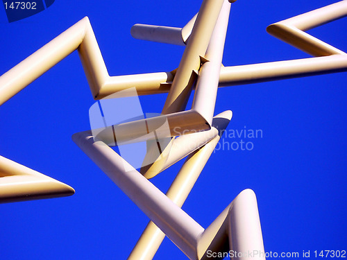 Image of Detail of yellow metal outdoor lightning sculpture