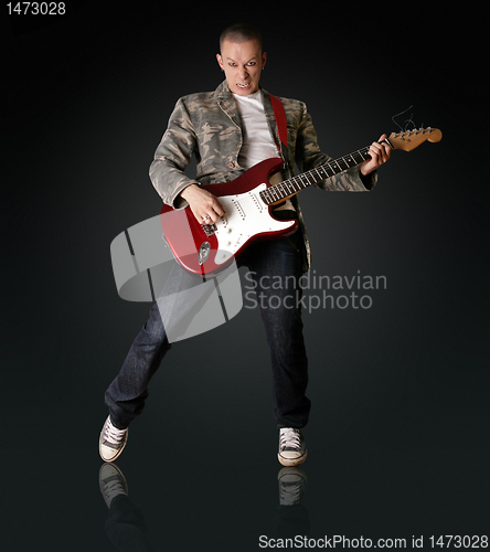 Image of punk man with the guitar