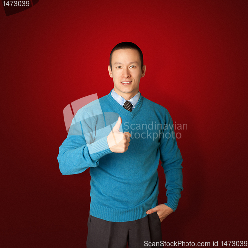 Image of young businessman in blue