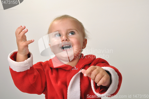 Image of smiling Santa toddler girl