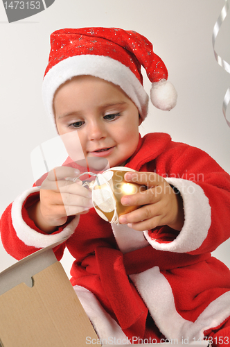 Image of smiling Santa toddler girl