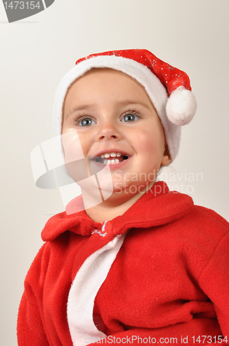 Image of smiling Santa toddler girl