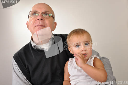 Image of cute toddler girl with father