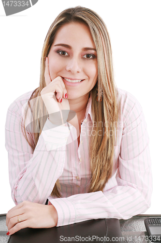 Image of portrait of a young business woman with papers in the office