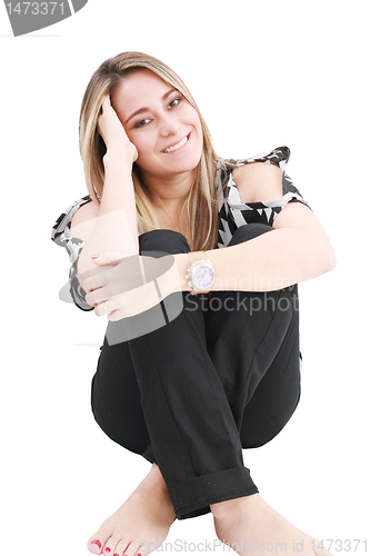 Image of Beautiful girl sitting in the floor, isolated on white