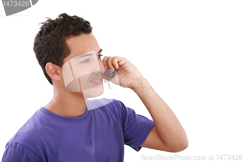 Image of Handsome man portrait talking at the cell phone isolated on whit