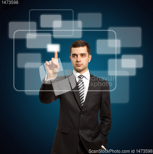 Image of businessman push the button