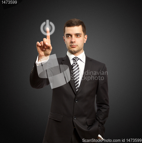 Image of businessman push the button