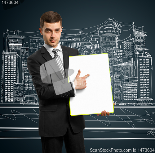 Image of businessman with empty write board