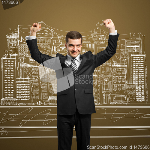 Image of businessman with hands up