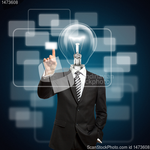 Image of businessman with lamp-head push the button