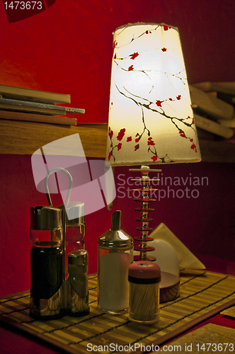 Image of Lamp next to sugar, tea, coffee container