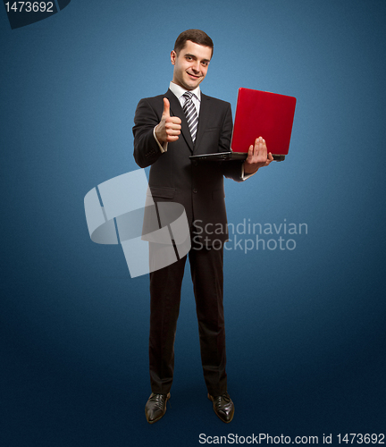 Image of businessman with laptop shows well done