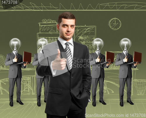 Image of lamp head business people with laptops