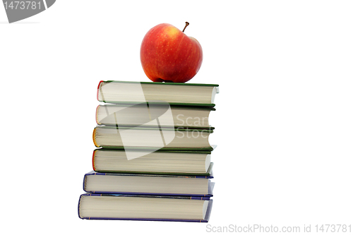 Image of apple on pile of books 