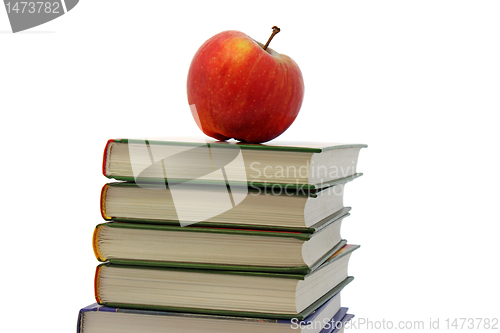 Image of apple on pile of books 