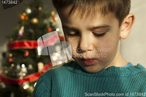 Image of Unhappy child on Christmas