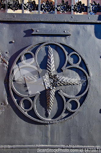 Image of Old metal gate decorations. Retro architecture.