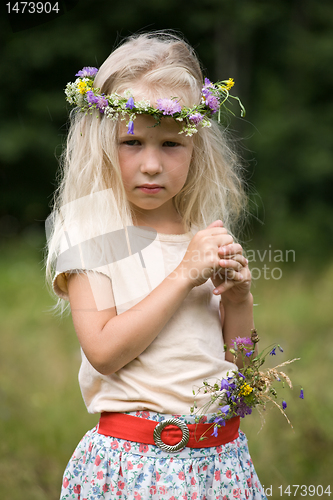 Image of little blonde girl in flower wreath