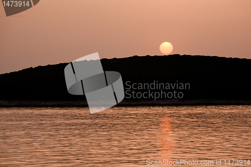 Image of seascape with orange sunset