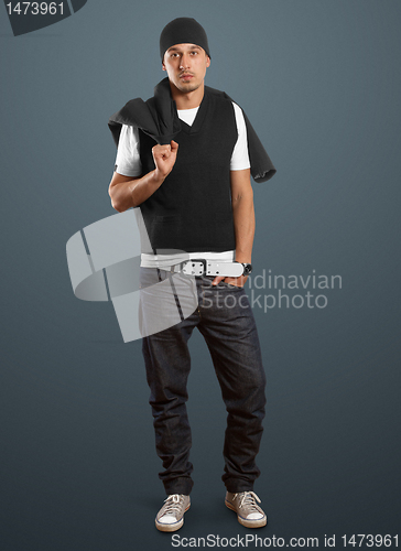 Image of stylish man looking at camera