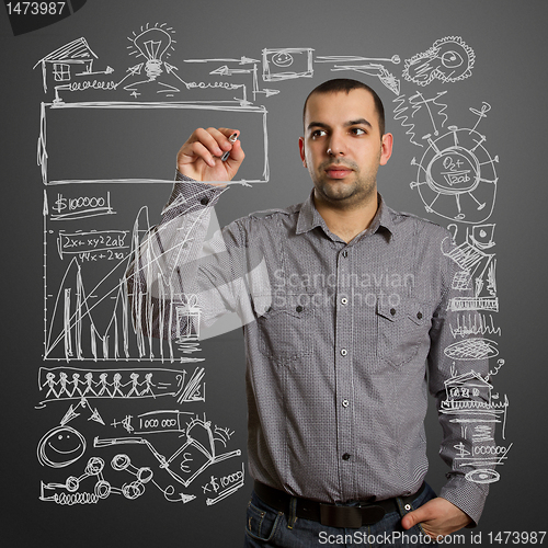 Image of businessman writing something