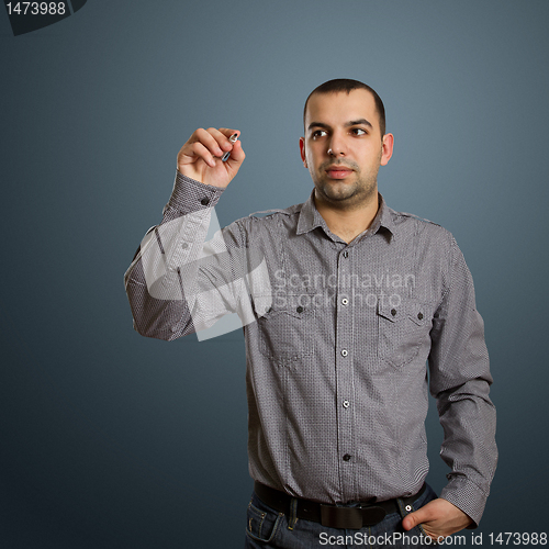 Image of businessman writing something