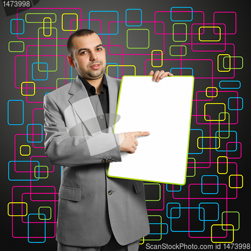 Image of happy businesswoman holding blank white card