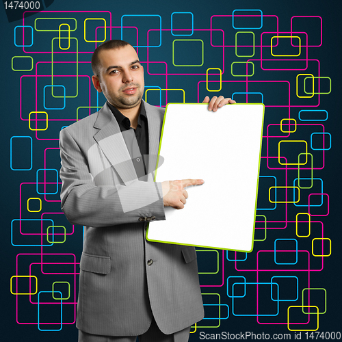 Image of happy businesswoman holding blank white card