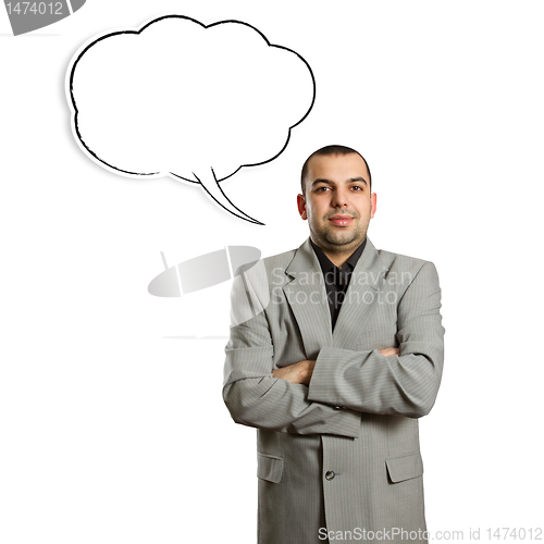 Image of male in suit with crossed hands and speech bubble