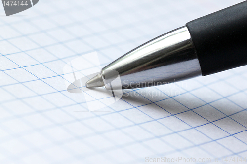 Image of pen at a copybook