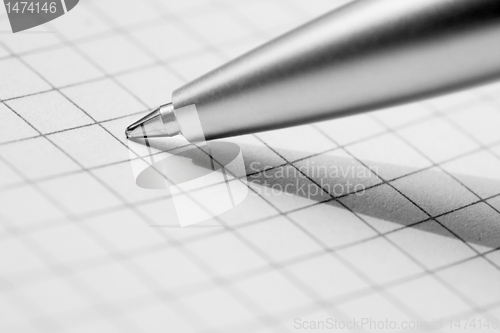 Image of pen at a copybook