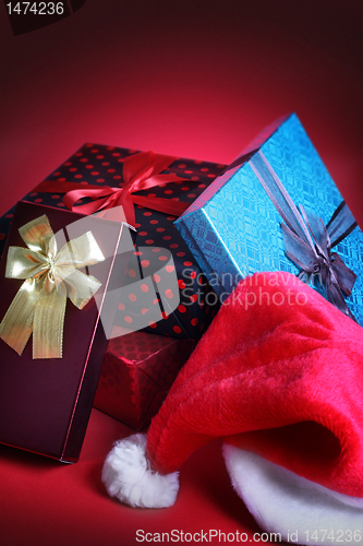 Image of Christmas gift and santa hat