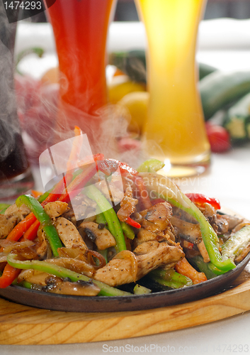 Image of original fajita sizzling hot  on iron plate