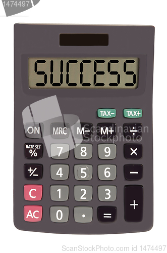 Image of Old calculator on white background showing text "success"