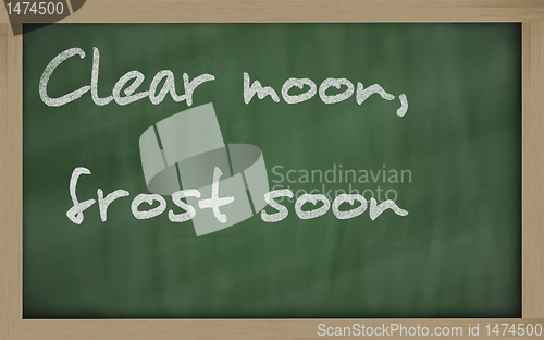 Image of " Clear moon, frost soon " written on a blackboard