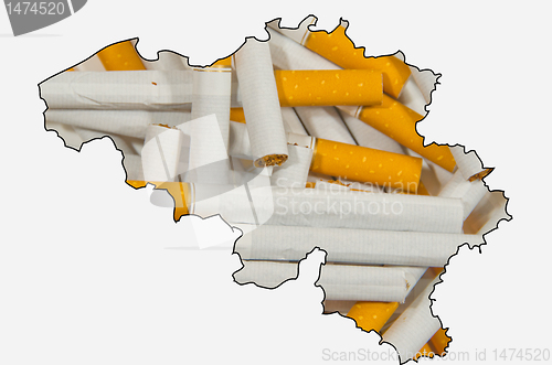 Image of Outline map of Belgium with cigarettes in background