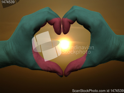 Image of Heart and love gesture by hands colored in bangladesh flag durin